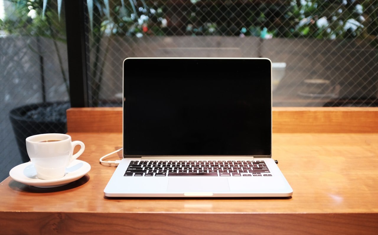 Clean minimal productivity workspace with laptop — Notion tips and tricks
